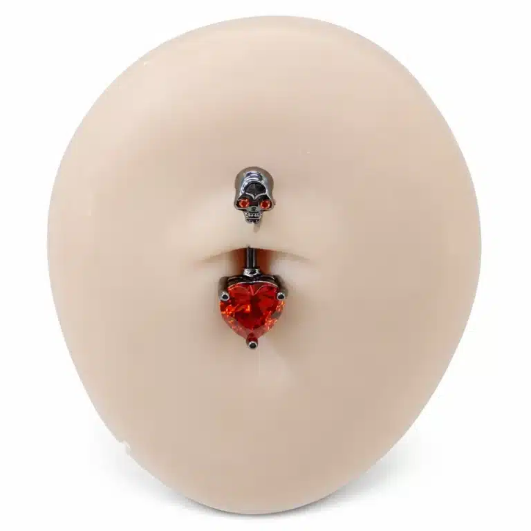 Piercing nombril tête de mort cœur
